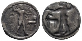 Bruttium, Kaulonia, c. 525-500 BC. AR Stater (27mm, 7.45g, 12h). Apollo advancing r., holding branch; small daimon running r. on Apollo's l. arm; to r...