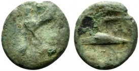 Bruttium, Laos, c. 350-300 BC. Æ (13mm, 1.51g). Female head facing (Demeter?) r. R/ Two birds crossing paths. Cf. HNItaly 2304. Rare, Fine
