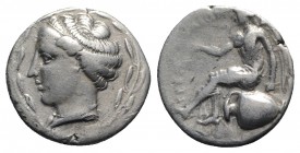 Bruttium, Terina, c. 440-425 BC. AR Stater (21mm, 7.45g, 9h). Head of the nymph Terina l. within laurel wreath. R/ Nike seated l. on amphora, holding ...