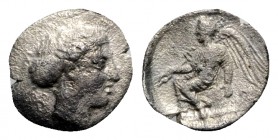 Bruttium, Terina, c. 420-400 BC. AR Triobol (11mm, 1.13g, 9h). Head of nymph r., hair bound in sphendone. R/ Nike seated l. on cippus, holding caduceu...