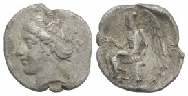 Bruttium, Terina, c. 420-400 BC. AR Triobol (12mm, 1.18g, 9h). Head of nymph l., hair bound in sphendone. R/ Nike seated l. on cippus, holding wreath....