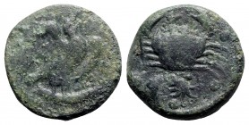Sicily, Akragas, c. 416-406 BC. Æ Hemilitron (27mm, 20.67g, 6h). Eagle standing r. on tunny. R/ Crab; conch shell and octopus below, six pellets aroun...