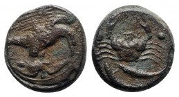 Sicily, Akragas, c. 416-406 BC. Æ Hexas (18mm, 7.74g, 12h). Eagle standing r. on bird. R/ Crab; two pellets flanking; below, two fish l. Westermark, C...