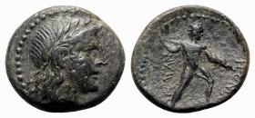 Sicily, Akragas, c. early 2nd century BC. Æ (23mm, 7.97g, 12h). Laureate head of Apollo r. R/ Warrior advancing r., brandishing spear. CNS I, 123; SNG...