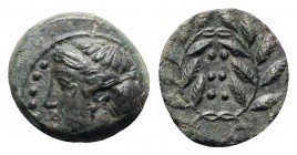 Sicily, Himera, c. 420-407 BC. Æ Hemilitron (16mm, 2.99g, 7h). Head of nymph l.; six pellets before. R/ Six pellets within wreath. CNS I, 35; SNG ANS ...