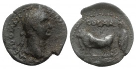 Domitian (81-96). Achaea, Patras. Æ (24mm, 6.10g, 9h). AD 85/6. Laureate head r. R/ Priest l., with vexillum, ploughing with two oxen. Cf. RPC II 255f...
