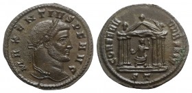 Maxentius (307-312). Æ Follis (27mm, 6.07g, 11h). Ticinum, 307-8. Laureate head r. R/ Roma seated facing, head l., in hexastyle temple, holding globe ...
