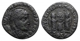 Constantine I (307/310-337). Æ Follis (16mm, 2.72g, 6h). Siscia, AD 318. Laureate, helmeted and cuirassed bust r. R/ Two victories standing facing one...
