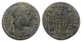 Constantine I (307/310-337). Æ Follis (19mm, 2.52g, 6h). Constantinople, 330-3. Rosette-diademed, draped and cuirassed bust r. R/ Two soldiers flankin...