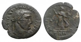 Maximinus II (310-313). Æ Follis (22mm, 4.27g, 3h). Nicomedia, AD 311. Laureate head r. R/ Sol standing l., raising hand, holding head of Serapis; Γ//...
