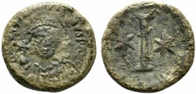 Justinian I (527-565). Æ 10 Nummi (17.5mm, 5.50g). Rome or Ravenna, 547-549. Helmeted and cuirassed facing bust, holding globus cruciger and shield. R...