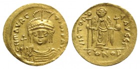 Maurice Tiberius (582-602). AV Solidus (22mm, 4.43g, 6h). Constantinople, 583/4-602. Helmeted, draped and cuirassed bust facing, holding globus crucig...