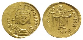 Maurice Tiberius (582-602). AV Solidus (22mm, 4.41g, 6h). Constantinople, 583/4-602. Helmeted, draped and cuirassed bust facing, holding globus crucig...