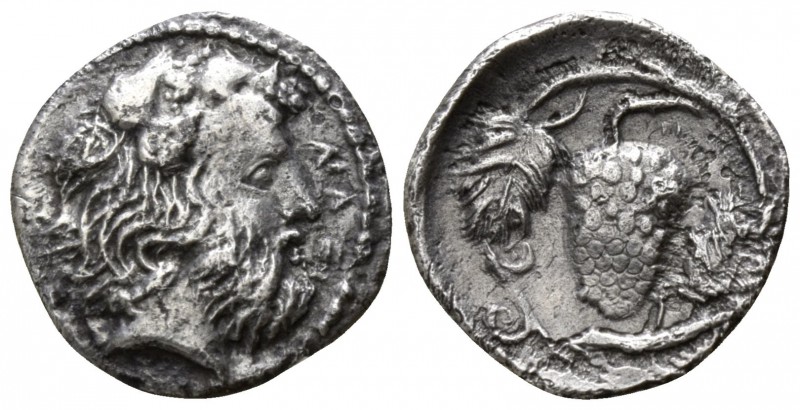 Sicily. Naxos circa 420-403 BC.
Litra AR

11mm., 0,68g.

Bearded head of Di...