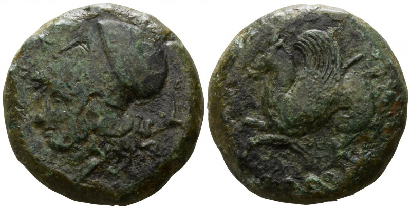 Sicily. Syracuse circa 390 BC.
Drachm Æ

24mm., 17,77g.

[Σ]ΥΡ[Α]; helmeted...