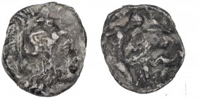 Calabria, Tarentum. Circa 325-280 BC. AR Diobol (0.95g, 11mm, 11h). Head of Athena to right, wearing Attic helmet adorned with Skylla / Herakles kneel...