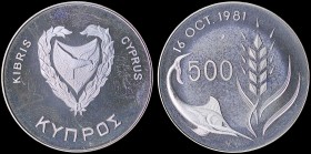 CYPRUS: 500 Mils (ND 1981) in copper-nickel commemorating the World Food Day with shielded arms within wreath on obverse. Denomination divides swordfi...