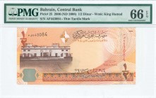 BAHRAIN: 1/2 Dinar (Law 2006 - ND 2008) in orange and brown on multicolor unpt with old Bahrain Court building at left. S/N: "AF 443084". WMK: King Ha...