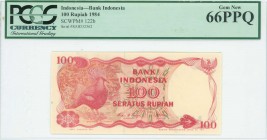 INDONESIA: 100 Rupiah (1984) lithographed in red on multicolor unpt with Goura Victoria at left. S/N: "RAB 332562". WMK: Arms. Inside holder by PCGS "...