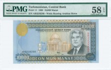 TURKMENISTAN: 10000 Manat (1998) in light blue, light brown and red on multicolor unpt with President Saparmurat Niyazov at right. S/N: "AB 3238288". ...