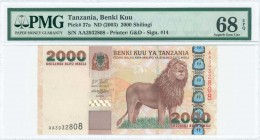 TANZANIA: 2000 Shilingi (ND 2003) in brown, tan and green on multicolor unpt with lion at center right. S/N: "AA 3932808". Giraffes head and value. Si...