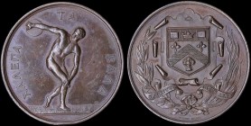 GREAT BRITAIN: Bronze British educational award medal. Discus thrower on obverse and motto "SPIRITUS INTUS ALIT" below shield upon a scroll tablet & C...