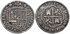 Philip II (1556-1598). 8 reales. 1586. Segovia. (Cal-685). Ag. 26,44 g. Aqueduct with 2 rows of 7 arches. Striking defect on obverse. Some scratches. ...