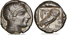 ATTICA. Athens. Ca. 465-455 BC. AR tetradrachm (23mm 17.14 gm, 1h). NGC XF 5/5 - 3/5. Head of Athena right, wearing crested Attic helmet ornamented wi...