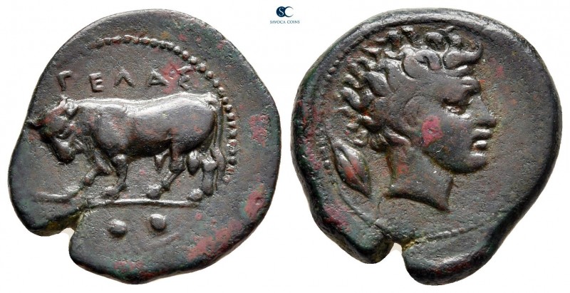 Sicily. Gela circa 420-405 BC. 
Tetras Æ

19 mm, 3,67 g

Head of young rive...