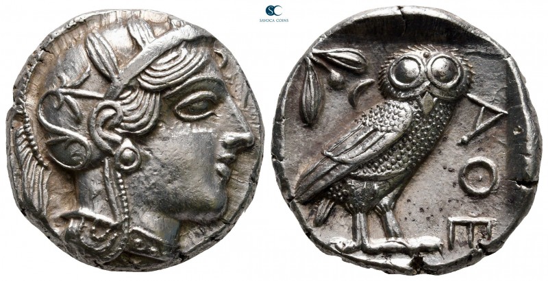 Attica. Athens circa 454-404 BC.
Tetradrachm AR

25 mm, 17,21 g

Head of At...