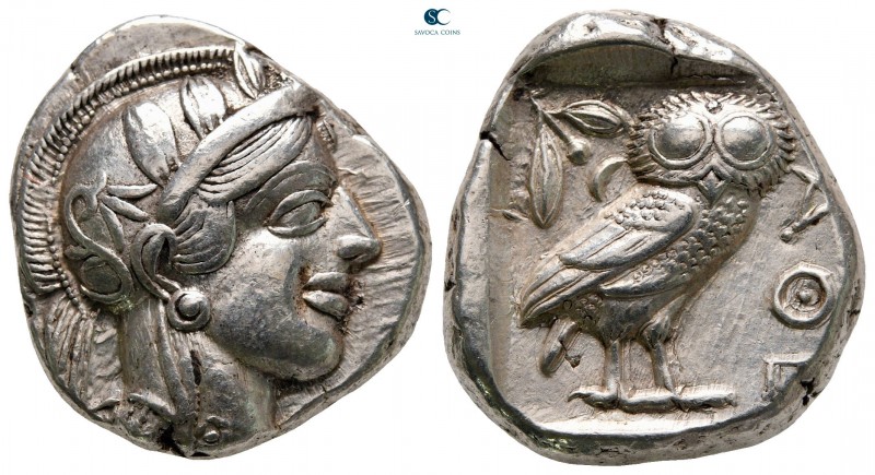 Attica. Athens circa 454-404 BC.
Tetradrachm AR

25 mm, 17,17 g

Head of At...