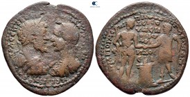 Caria. Alinda. Septimius Severus, with Caracalla AD 193-211. KOΡ. ΜΕΝΙΠΠΟΣ (Kor. Menippos), magistrate. Bronze Æ