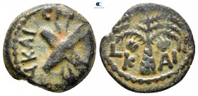 Judaea. Jerusalem. Procurators. Antonius Felix CE 52-60. In the name of Nero Claudius Caesar and Britannicus. Dated RY 14 of Claudius=CE 54. Prutah Æ