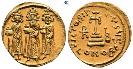 Heraclius, with Heraclius Constantine and Heraclonas AD 610-641. Struck AD 638-639. Constantinople. 6th officina. Solidus AV