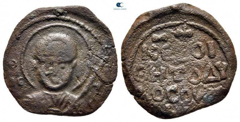 Tancred AD 1101-1103. Antioch
Follis Æ

21 mm, 3,39 g

Nimbate bust of St. ...