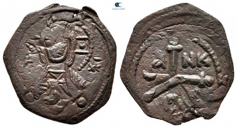 Tancred AD 1101-1103. Antioch
Follis Æ

23 mm, 2,64 g

IC XC, nimbate bust ...