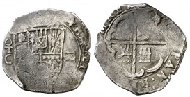 (1595-1598). Felipe II. Toledo. C. 2 reales. (Cal. tipo 369). 6,62 g. Tipo "OMNIVM". Fecha no visible en reverso. Con gráfila circular. Acuñación floj...