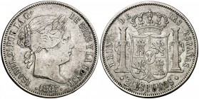 1867. Isabel II. Madrid. 2 escudos. (Cal. 204). 25,57 g. Rayas en reverso. MBC-.