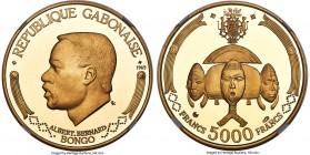 Republic gold Proof "Reliquary Figure - Bakota" 5000 Francs 1969-NI PR68 Ultra Cameo NGC, KM8, Fr-7. Mintage: 4,000. This interesting commemorative is...