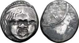 Etruria, Populonia AR 20 Asses. 3rd century BC. Facing head of Metus, tongue protruding, hair bound with diadem; [X X below] / Etruscan legend: [PVPL]...