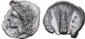 Lucania, Metapontion AR Stater. Circa 330-290 BC. Atha-, magistrate. Head of Demeter to left, wearing grain wreath, triple pendant earring and necklac...