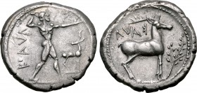 Bruttium, Kaulonia AR Stater. Circa 475-425 BC. Nude Apollo walking to right, holding laurel branch in upright right hand, small daimon running to lef...