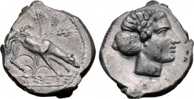 Sicily, Segesta AR Didrachm. Circa 412/10-400 BC. Hound scenting to right, three grain ears behind; ΣEΓEΣTA[ΞIB] (retrograde) in relief within linear ...