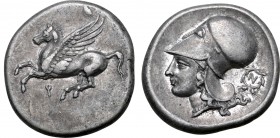 Corinthia, Corinth AR Stater. Circa 375-345 BC. Pegasos flying to left; Ϙ below / Head of Athena to left, wearing Corinthian helmet; N within wreath b...