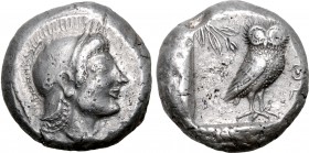 Attica, Athens AR Tetradrachm. Circa 515-500/490 BC. Archaic head of Athena to right, wearing crested Attic helmet decorated with chevron and dot patt...
