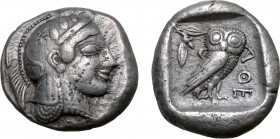 Attica, Athens AR Tetradrachm. Circa 470-465 BC. Archaic head of Athena to right, wearing crested Attic helmet decorated with dot pattern / Owl standi...