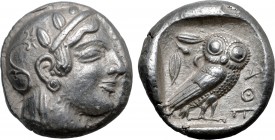 Attica, Athens AR Tetradrachm. Circa 470-465 BC. Head of Athena to right, wearing crested Attic helmet ornamented with three olive leaves above visor ...