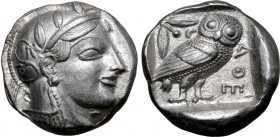 Attica, Athens AR Tetradrachm. Circa 465-460 BC. Head of Athena to right, wearing crested Attic helmet ornamented with three olive leaves above visor ...