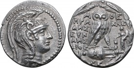 Attica, Athens AR New Style Tetradrachm. Circa 107/106 BC. Herakleides, Eukles and Diokles, magistrates. Helmeted head of Athena Parthenos to right, w...
