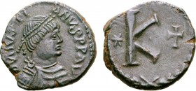 Justinian I Æ 20 Nummi. Rome, AD 537-539. D И IVSTIANVS P P AV (sic), pearl-diademed, draped and cuirassed bust to right / Large K, star to left, cros...